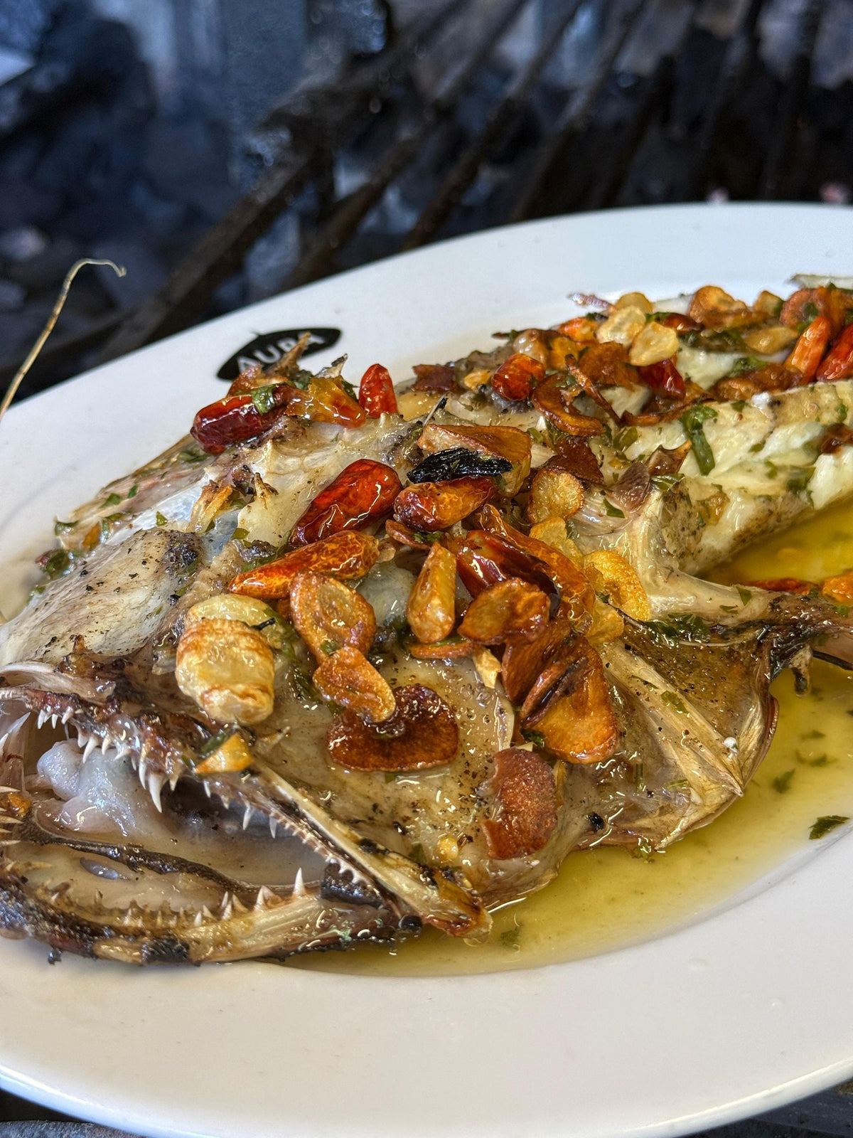 Pescado servido en Aupa, fotografía de la web del restaurante